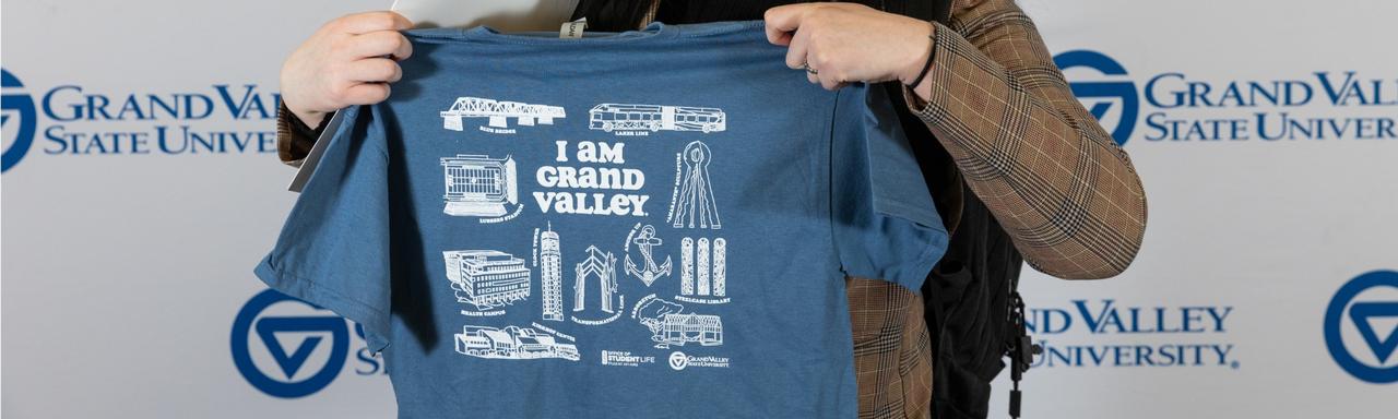 T-shirt with text that reads "I am Grand Valley" and assorted GVSU icons